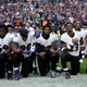 Baltimore Ravens taking a knee this morning in game against the Jacksonville Jaguars in London. Image via the AP.